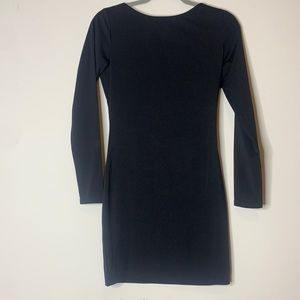 Strapped back long sleeve black dress